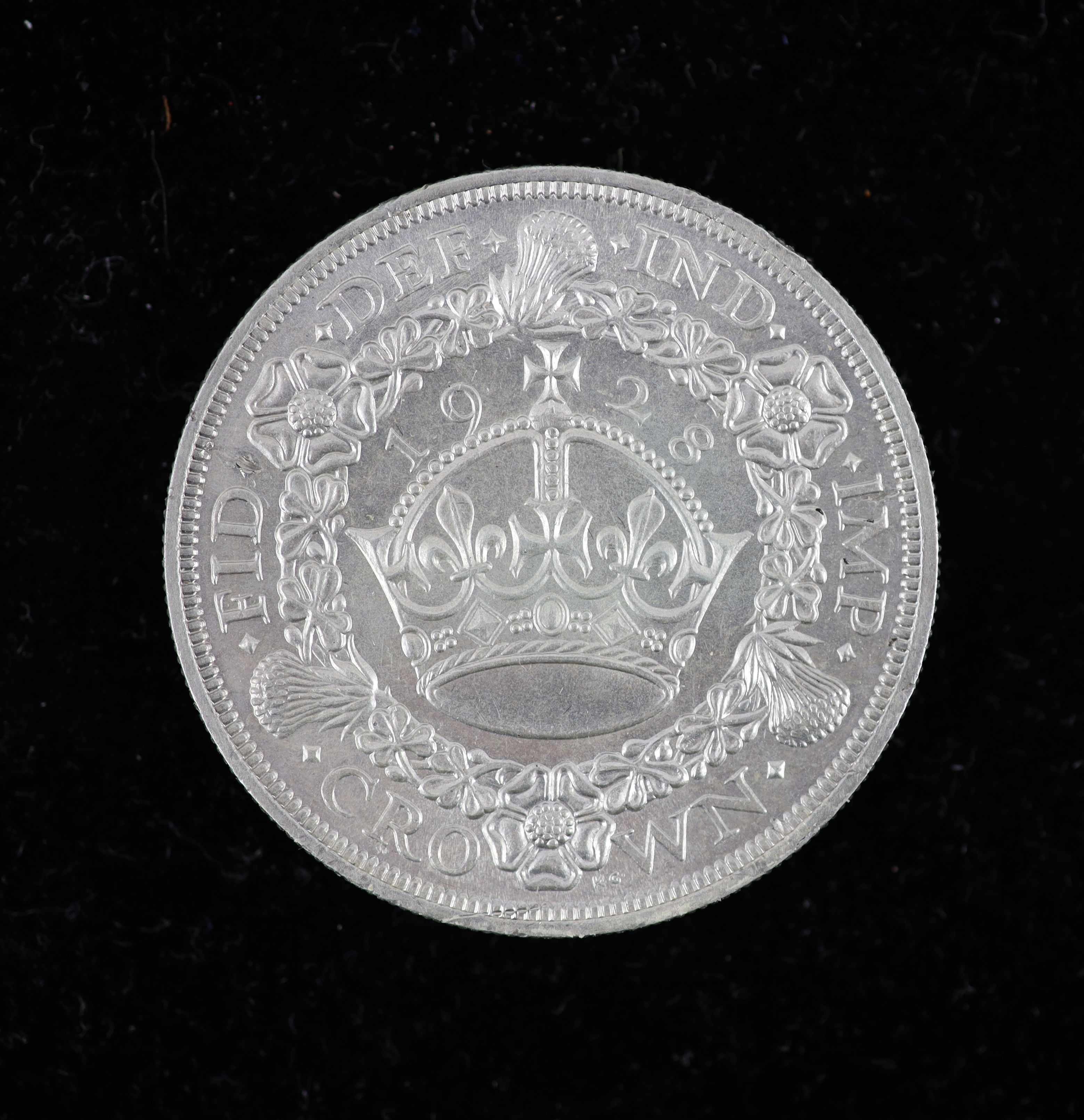A George V specimen set of nine coins, 1928, fourth coinage, comprising Crown, 1928 (S 4036), cleaned, obv. edge nick at 12, otherwise EF, halfcrown to threepence, cleaned otherwise near EF, penny to farthing, toned and